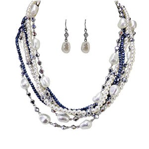 Pearl multi strand necklace with black and gray glass beads, textured white beads, and round white pearl beads. Fashion Forward Set