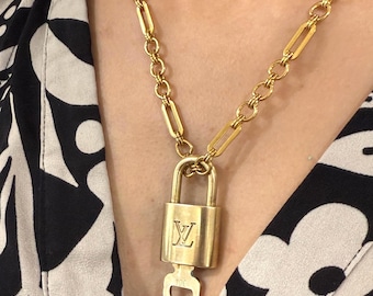 Louis Vuitton Lock and Key Authentic with a chain