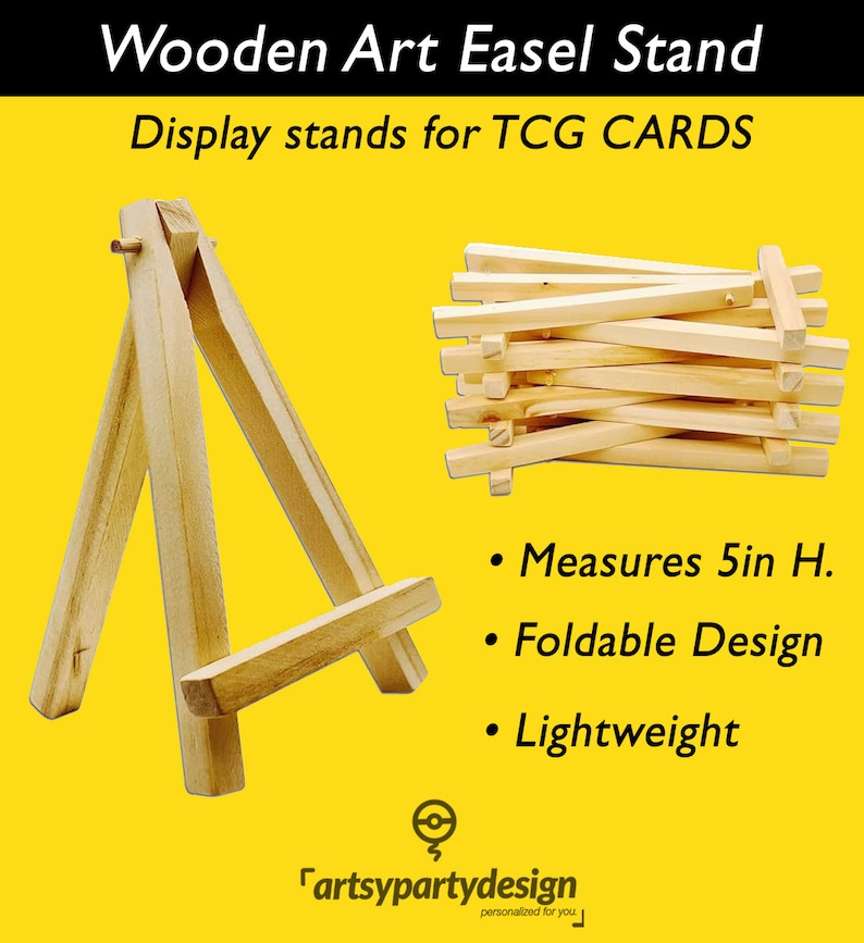 May include: Wooden easel stand for displaying trading cards. The stand is 5 inches tall, foldable, and lightweight. It is made of natural wood and has a simple design.