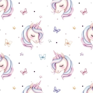 May include: A seamless pattern featuring watercolour illustrations of unicorn heads with closed eyes, pink and blue manes, and gold horns. The background is white with scattered stars, butterflies, and dots.