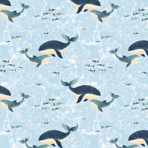 Könnte beinhalten: Ein sich wiederholendes Muster mit Walen und Fischschwärmen auf hellblauem Hintergrund. Die Wale sind dunkelblau mit cremefarbenen Bäuchen, die Fische klein und grau. Das Design hat einen Aquarelleffekt.