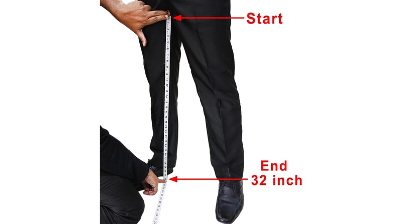 a man measuring his pants with a measuring tape