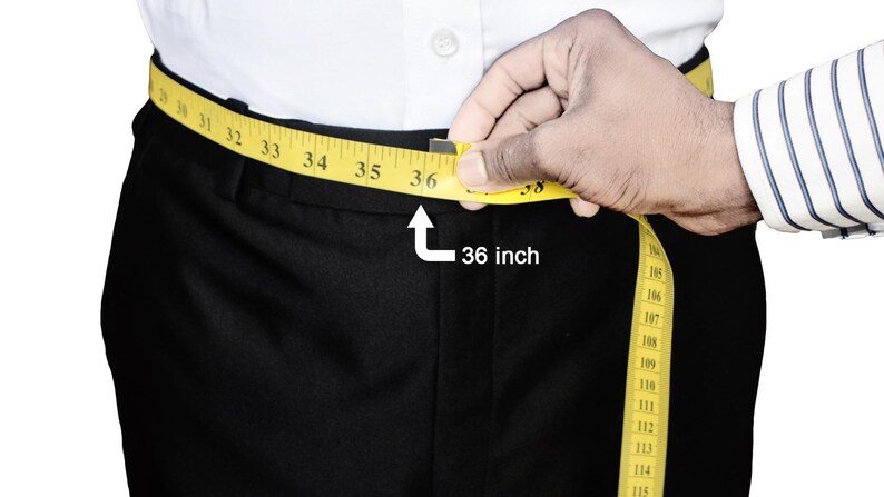a man measuring his waist with a tape