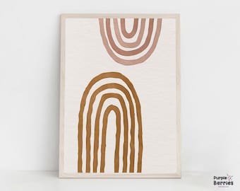 Pode incluir: Uma impressão digital com dois arco-íris abstratos em tons de marrom e rosa. Os arco-íris estão sobre um fundo branco e emoldurados em uma moldura de madeira clara.