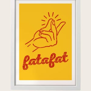 A framed artwork with a yellow background and a red hand gesture. The text below the frame reads "fatfat".