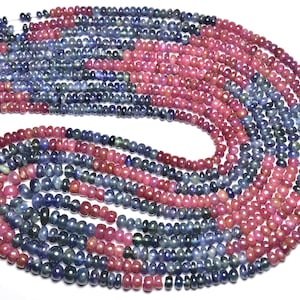 Peut inclure: Un brin de perles de pierres précieuses bleues et roses. Les perles sont facettées et ont une finition lisse et polie. Les perles sont enfilées sur un cordon élastique transparent.