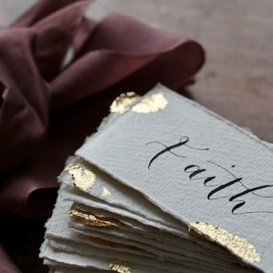 Recycled Cotton Rag Gold Leaf Wedding Place Name Cards with Elegant Hand Lettered Modern Calligraphy by Laneys Lettering Decadent Table Settings for Weddings