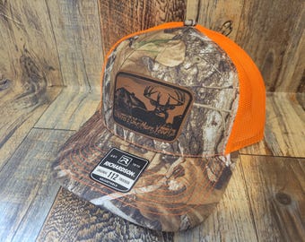 Needs one more year whitetail hunting leather patch hat Richardson camo hat cap New