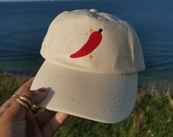 Natural Off-white hat with chilli and sparkles motif | baseball cap with embroidered detail | hat | chilli and sparkles | spicy cap dad hat