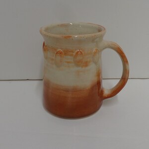 Handmade Rust Cream Glazed Porcelain Mug: Wheel Thrown, Oval Decoration (14 oz)