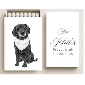 May include: A matchbox with a black and white illustration of a dog wearing a white bandana with the text "The John's". The matchbox also includes the text "Provo, Utah 08.23.2026".