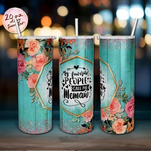 May include: A turquoise and gold 20 oz. stainless steel tumbler with a floral design and the text "My favorite people call me Memaw".