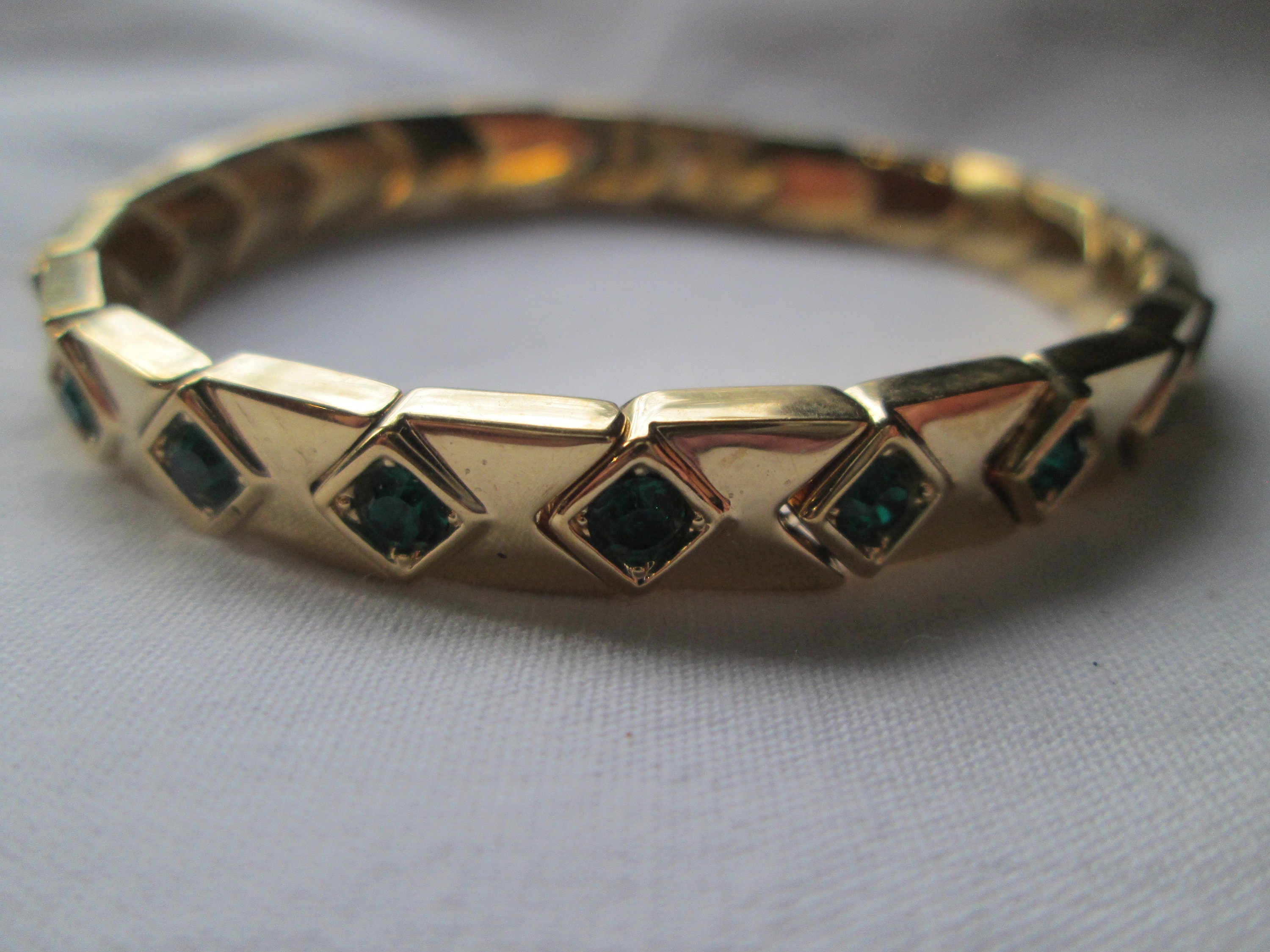 Nolan Miller Emerald Green Gold Plated Stretch Bracelet