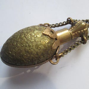 1910 Brass Mini Perfume Embossed Bottle Pendant