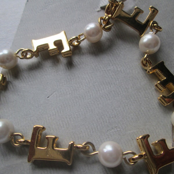 Marvella Pearl Gold Tone Initial F Bracelet with tag