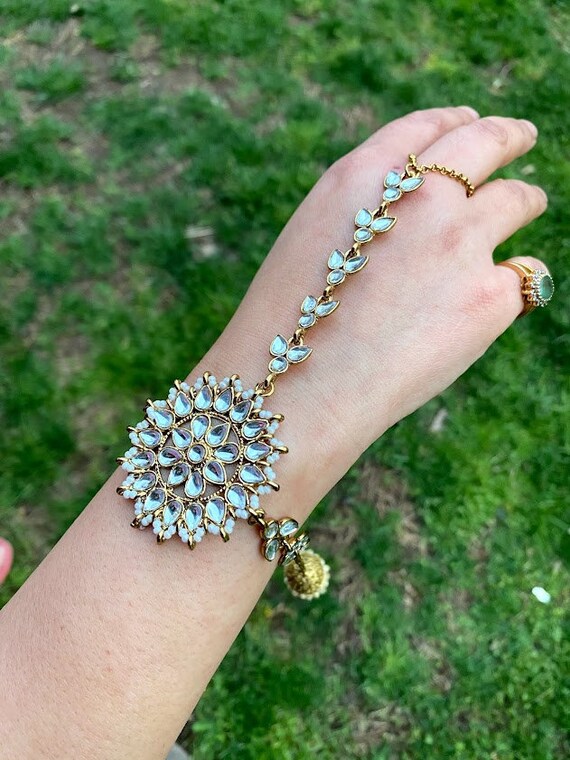 Single Gold Finished Kundan Pearl Bracelet/ Haathphool / Gold Finished Ring  Bracelet / Hand Harness/ Kundan Bracelet /hath Panja - Etsy | Pretty jewelry  necklaces, Hand bracelet with ring, Fancy jewellery designs