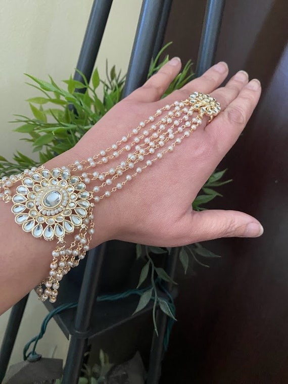 Riddhi Siddhee White Studs Gold Plated Kundan And Pearl Hath Phool Ring  Bracelet For Women And Girls - Fashion Jewellers India