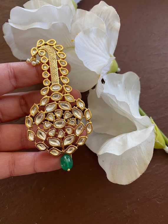 Kundan brooch deals