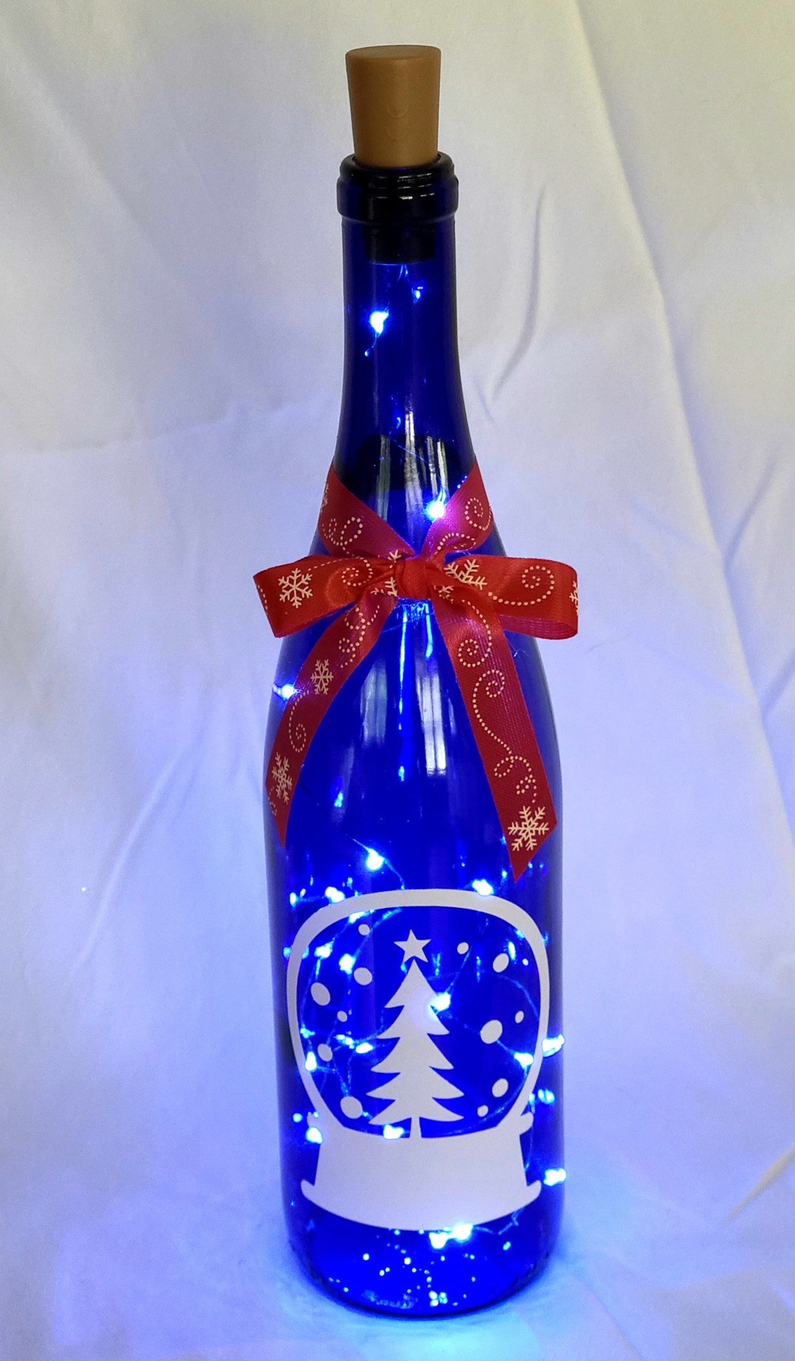 Lighted wine bottle Snow Globe Etsy
