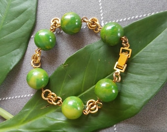 Pulsera vintage de cuentas de baquelita con espirales verdes - Tono dorado (18 cm)