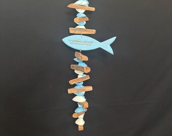 wooden engraved fish and shell with driftwood coastal wind catcher