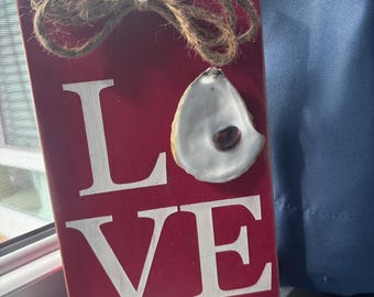 LOVE oyster shell sign