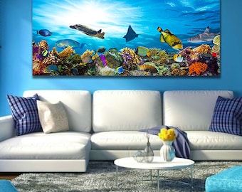 May include: A large rectangular canvas print depicting an underwater scene with a variety of colorful fish, coral, and marine life. The artwork features a turtle, a manta ray, and a bright sun shining through the water.