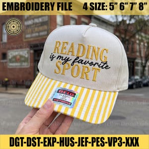 May include: A cream-colored baseball cap with a yellow and white striped brim. The front features embroidered text reading READING is my favorite SPORT. A sticker on the brim reads OTTO CLASSIC FIT OSFM. Available in 5, 6, 7, and 8 inch sizes.