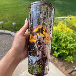 Jurassic park snow globe tumbler