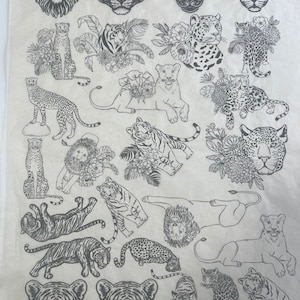 May include: A black and white line drawing of various wild cats, including lions, tigers, leopards, and cheetahs. The drawings are in a variety of poses, including standing, sitting, and lying down. Some of the drawings include floral elements.