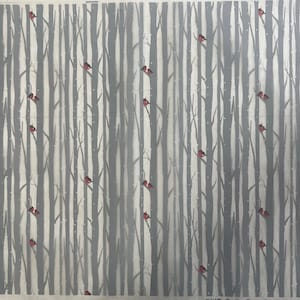 May include: A repeating pattern featuring grey tree trunks and red birds. The background is a light grey with small white dots, suggesting snowfall. The design evokes a winter or woodland theme.