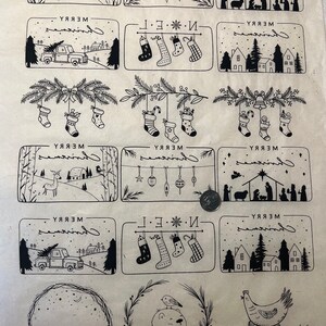 May include: A collection of black and white Christmas illustrations. The designs feature winter landscapes, hanging decorations, festive stockings, a truck carrying a tree, and a nativity scene. The words "Merry Christmas" are written in a decorative style.