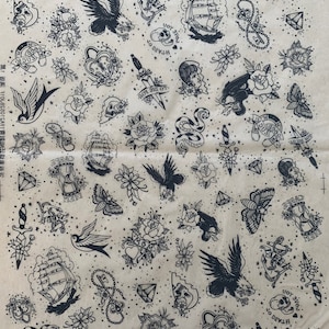 May include: A brown paper sheet with a repeating pattern of black traditional tattoo flash designs. The designs include a ship, a dagger, a heart, a snake, a bird, a skull, a horseshoe, a butterfly, a diamond, a rose, and a key.
