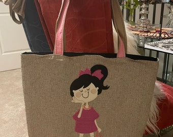 Our adorable and exclusive “ponytail menina” tote bag-made in Brazil just for you