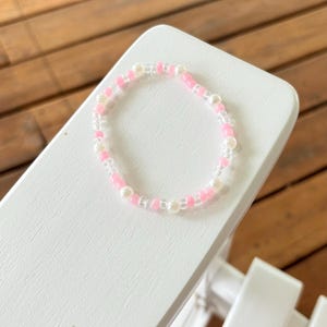 Pink and white bracelet