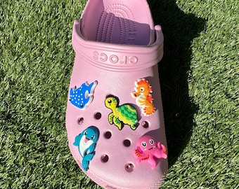 Charm de cocodrilo Ocean Life: Tortuga marina, delfín y pulpo (PVC)