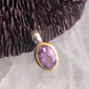 Artisan crafted faceted Amethyst Gold accented Matte Silver finish pendant