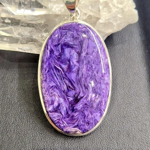 Oval shape charoite and sterling silver pendant