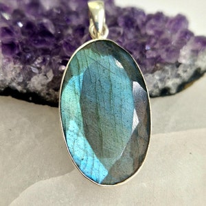 Artisan crafted blue faceted labradorite sterling silver pendant oval shape