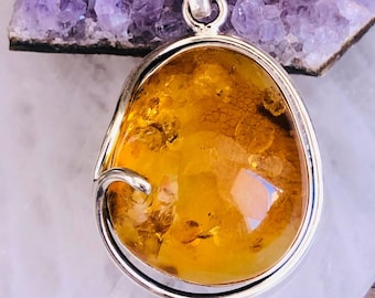 Magnifique Pendentif véritable ambre sertie en argent 925