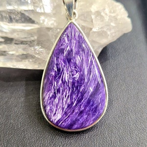 Drop shape charoite and sterling silver pendant