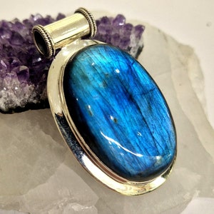 Gorgeous artisan crafted sterling silver and blue Labradorite oval shape pendant
