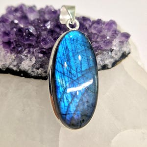 Artisan crafted blue labradorite sterling silver pendant oval shape