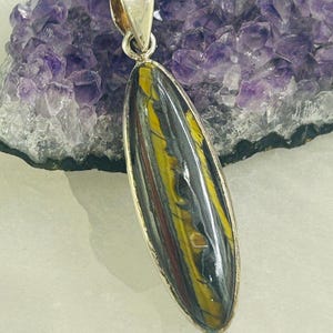 Tiger Iron eye sterling silver pendant