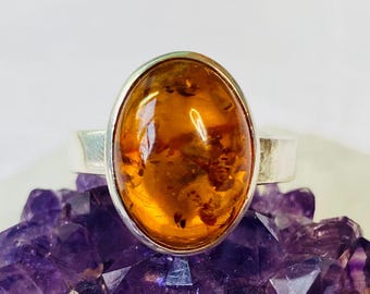 Ajustable ring handcrafted natural Baltic amber silver oval shape