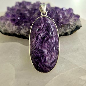 Oval charoite and sterling silver pendant