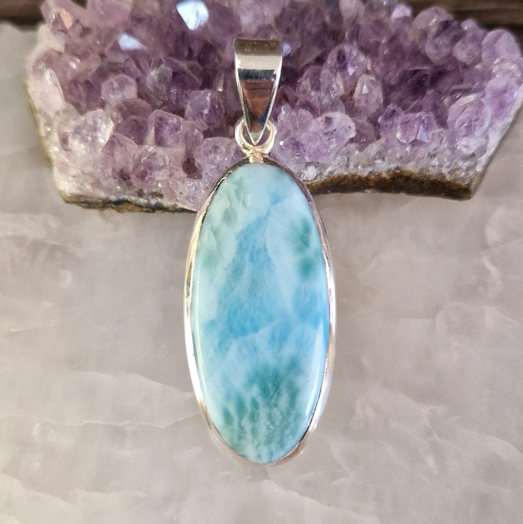 Artisan crafted unique Larimar and sterling silver pendant oval