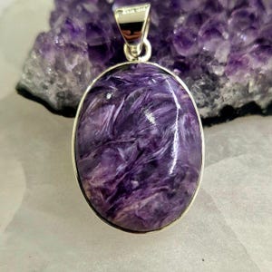 Oval charoite and sterling silver pendant