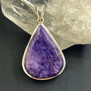 Drop shape charoite and sterling silver pendant