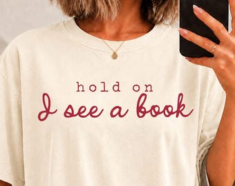 Book lover Shirt, sweatshirt, long sleeve, comfort colors Hold on I see a book, reading lover, librarian, fiction reader, reading club